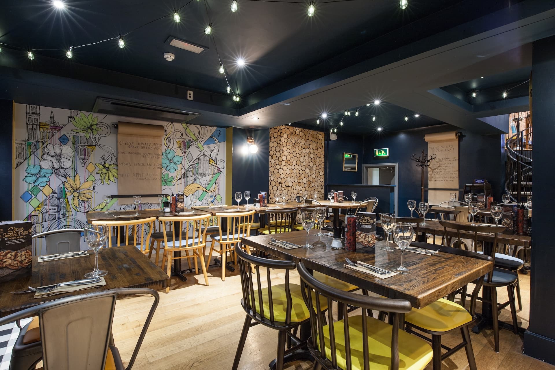 Zizzi Oxford, contemporary dining interior with creative design and warm atmosphere.