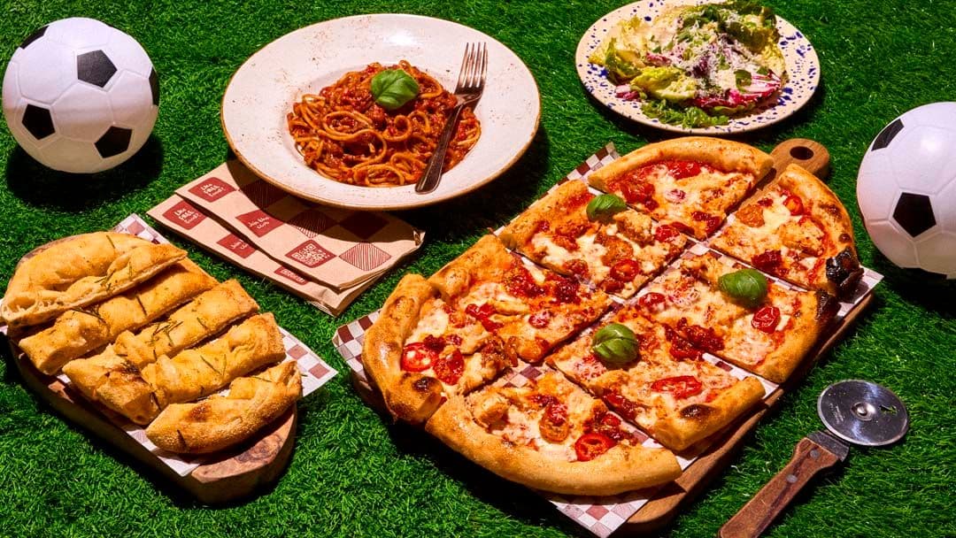 World Cup feast shot of pizza, pasta and salad