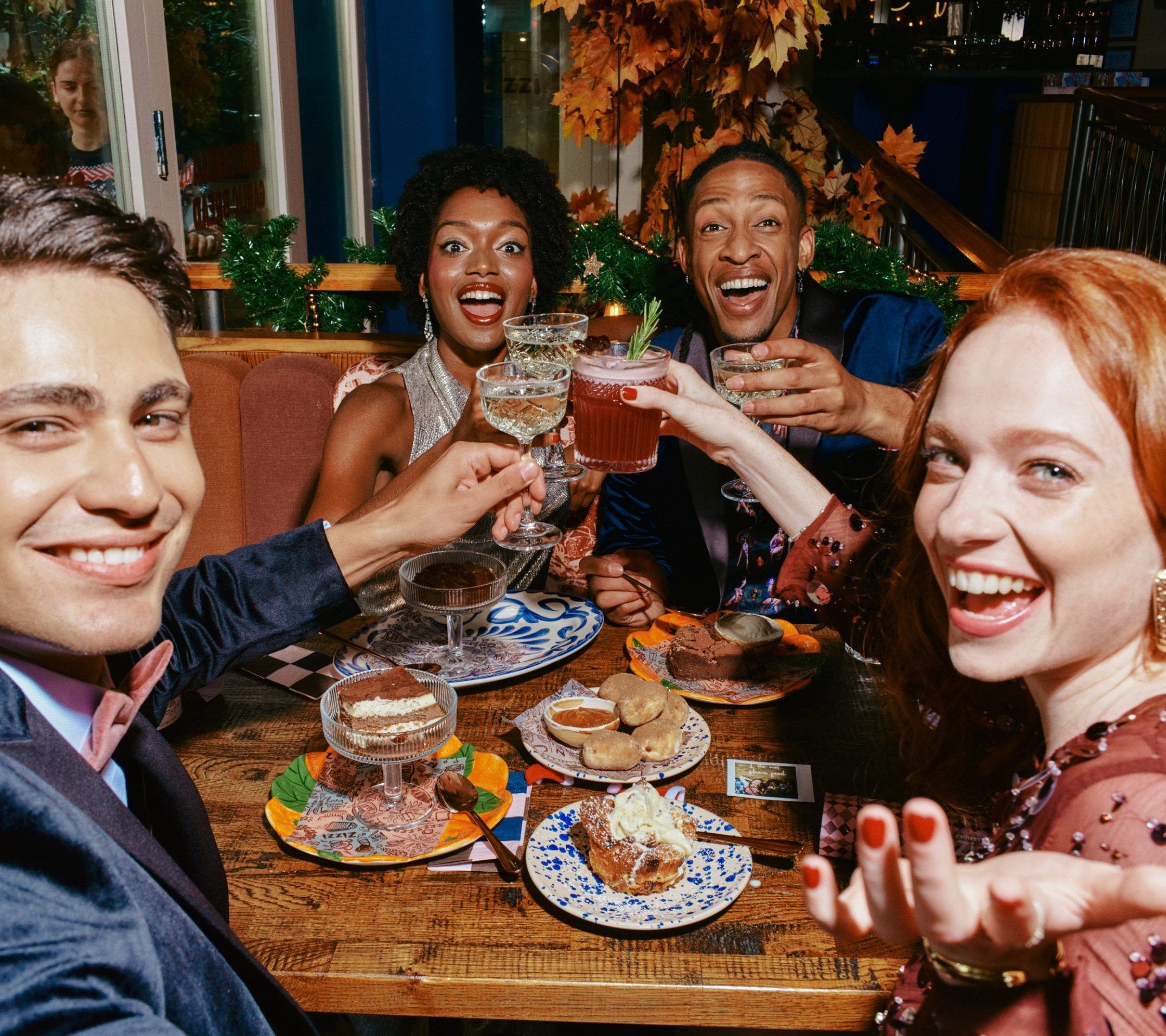Friends celebrating with cocktails