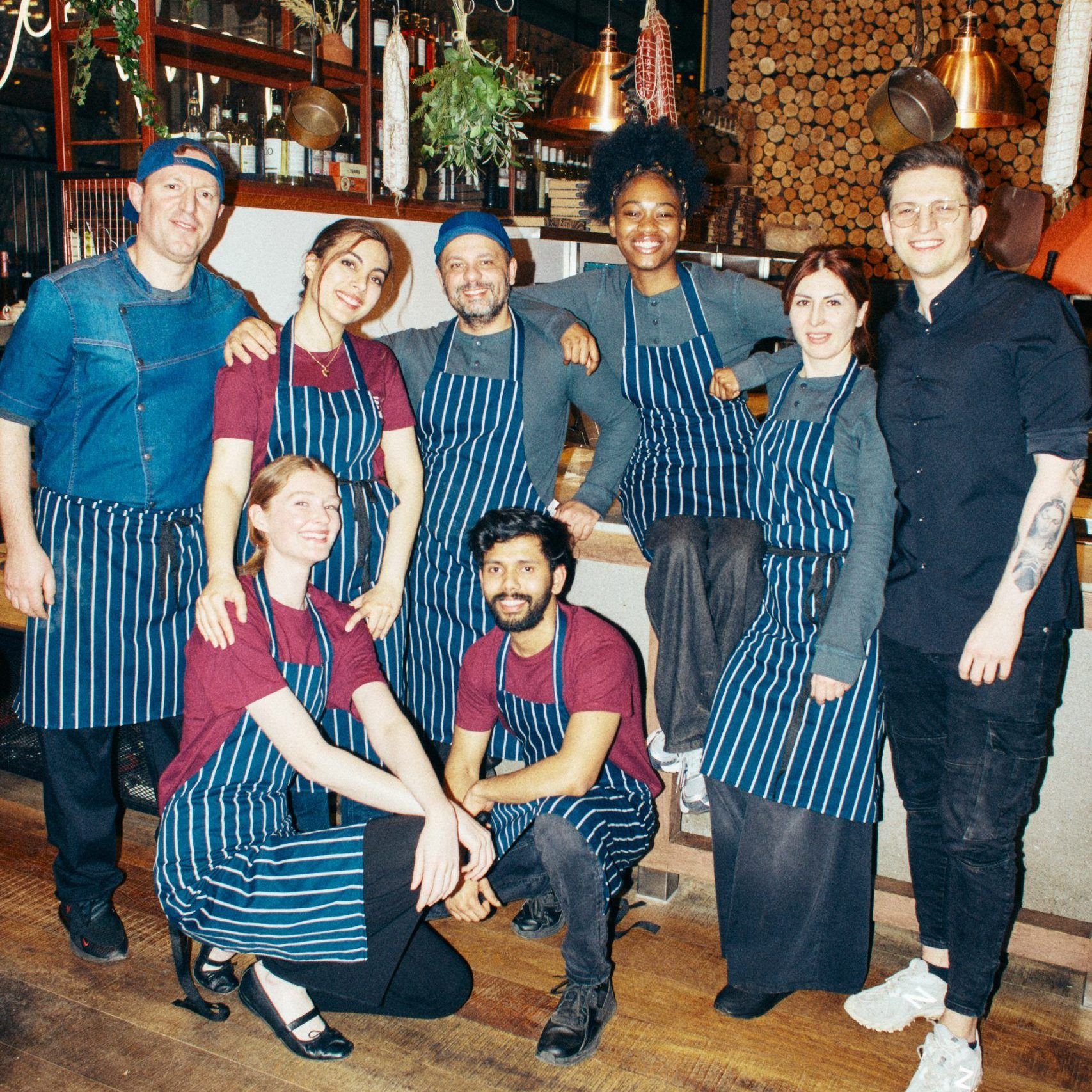 Group of team members smiling at the camera 