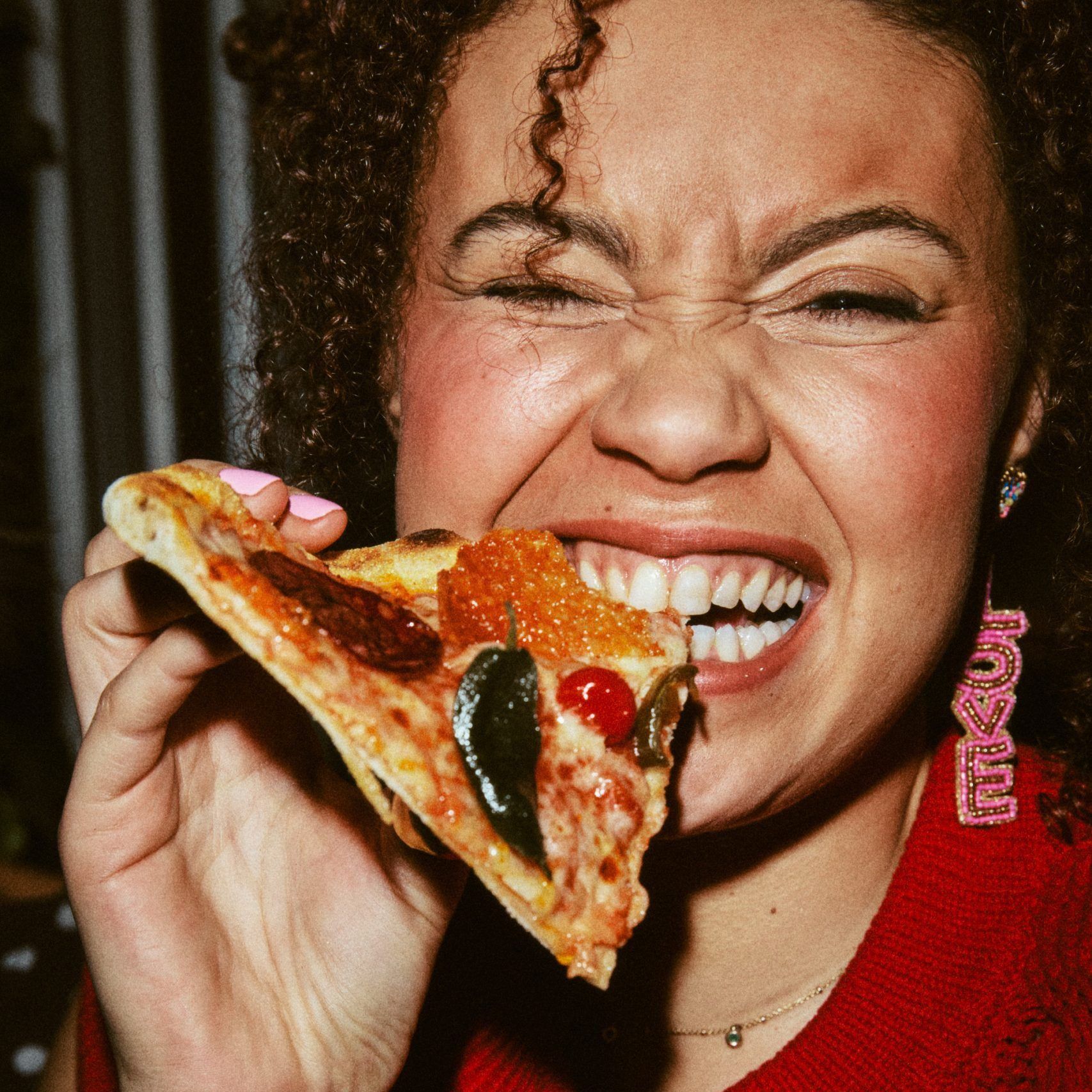 Woman enjoying pizza 