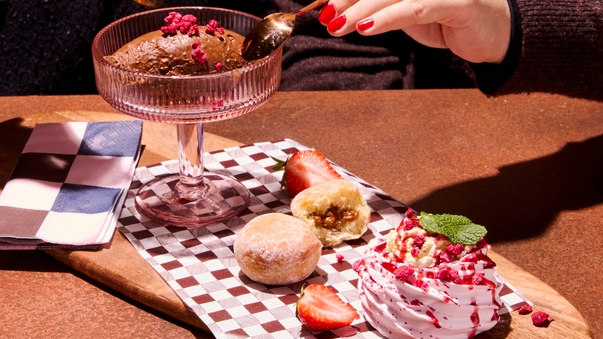 Valentine's Day Sharer Dessert with chocolate mousse, mini biscoff doughnuts and pink meringue. 